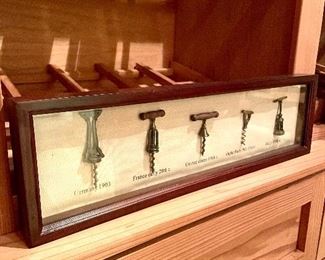 SOLD $32 - Decorative vintage wine openers in shadow box - 21 x 1.5 x 6