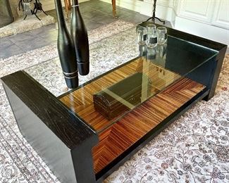 $400 - Contemporary glass top and wood coffee table, 52 x 29 x 18.