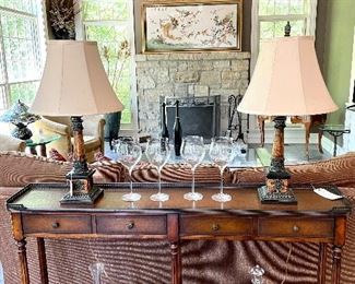 $1500 - Theodore Alexander Leather Wrapped Sofa Table ( retails for $2500) Excellent Condition; $40 - Pair of Table lamps (one is damaged) ; Tons of great luxury decor - come shop at the sale!