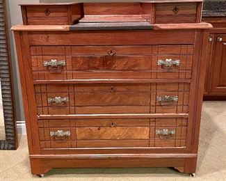 $400 - Antique Victorian Walnut drop center marble top dresser with burgled walnut drawers, casters and vanity mirror, makes for a beautiful and sturdy piece - Base 38.5 x18.5 x 39.5, with mirror 38.5 x 18.5x 77