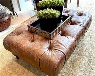 SOLD $400 -Tufted leather ottoman with nailhead trim - 42 x 28 x 16; $20 - tray; SOLD $18 -large faux greenery; SOLD $14 - small faux greenery