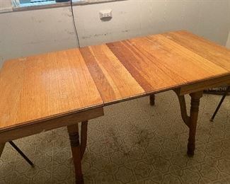 Old kitchen table with three leaves