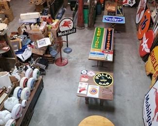 This photo shows the large collection of original  glass  gasoline pump globes for sale.