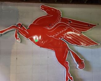 A rare Mobil Oil Pegasus porcelain 1-sided 108" by 84" sign. Two piece, some minor pits, paint in great shape