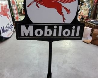 Original Vintage Mobil Oil Pegasus  Porcelain Sign on a Cast Iron Stand with a heavy Round Base. The sign measures 32" by 36"and is in very good condition.