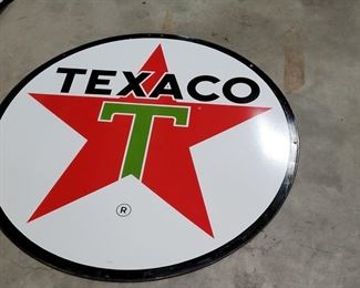 An original Texaco Porcelain 2 sided sign that measures 72" in diameter.  It dates to 1965 and is in very good condition with a few light pits on each side. 