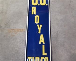An original U.S. Royal Tires Stamped Metal Sign, dated 1949 and measures 16" by 60". Very good condition with a few very small pits and light scratches.