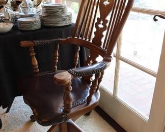 Antique reproduction swivel Windsor broad arm chair