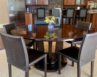 Table by Baker, 58" diameter table , 6 Arper brown leather chairs