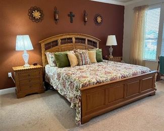 Amazing solid oak bedroom suite including a king size bed with two year old Tempurpedic mattress and boxsprings, two nightstands, highboy and dresser with mirror