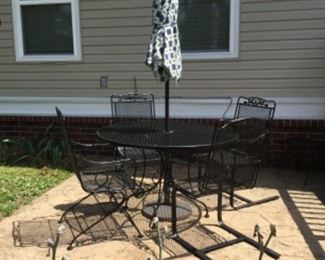 have moved patio table, 4 chairs, umbrella with stand to garage