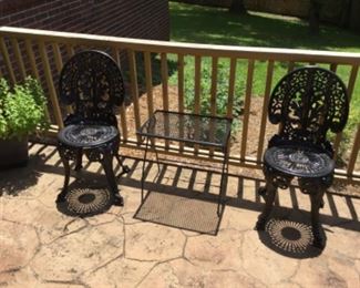 Moved to garage:  2 wrought iron chairs and small patio table -