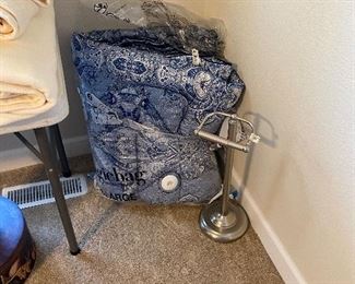Comforter - new in package + toilet paper floor holder