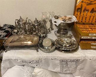 Silver plate serving pieces - tray with tea set, serving dish with lid, bowls, platters, candle sticks, wire basket