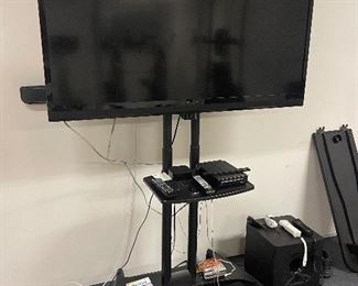 Insignia 55” tv on wheeled stand 