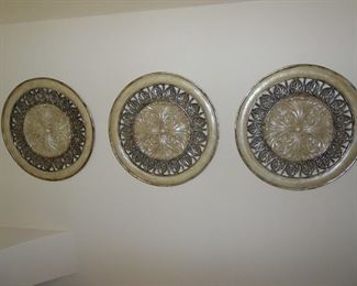 Three round decorative medallions $65