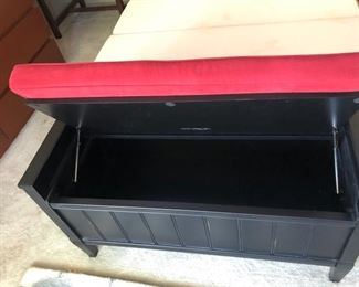Wood storage chest with red fabric top