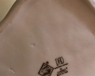 Tge mark of girl with puppy 