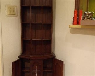 Curio Cabinet. Has a plate rail on the shelves