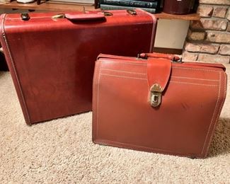 Vintage steer hide doctor’s case and vintage Samsonite leather covered suitcase