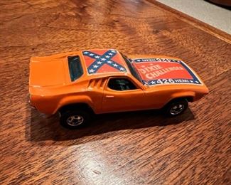 A sampling of the vintage Matchbox and Hot Wheels collection, including a 1970 Dixie Challenger