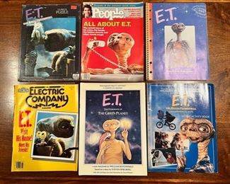 Cool collection of mostly 1982 original E.T. paraphernalia, including a never worn Hershey’s E.T. T-shirt & beanie, magazines cards and posters