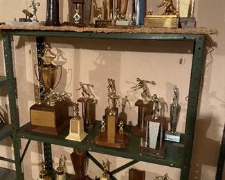 Collection of vintage trophies, including a few baseball trophies from the late-1930s.
