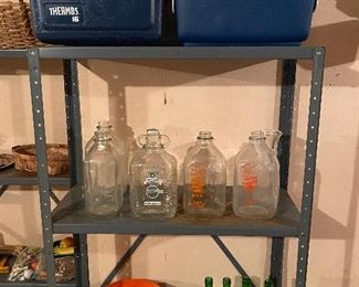 Vintage bottles, including soda and dairy.