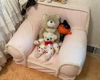 Child’s chair; stuffed animals.