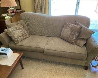 Upholstered couch by Rowe.