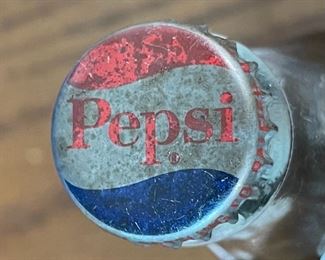 1950s Pepsi 6.5 Oz Swirl Bottle Full	8in H x 2.25in diameter at bottom	
