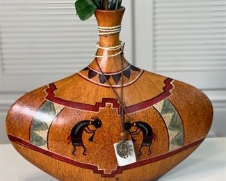 Resin Kokopelli Vase	vase: 13 x 15 x 3in	
