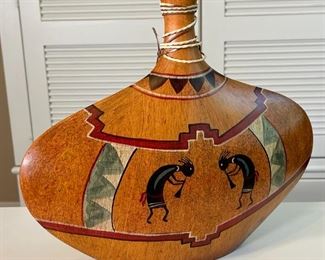 Resin Kokopelli Vase	vase: 13 x 15 x 3in	
