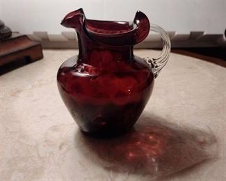 Hand blown ruffled top amethyst glass pitcher approximately 5 in tall