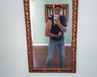 The mirror is priced to sell....the gun show is free!