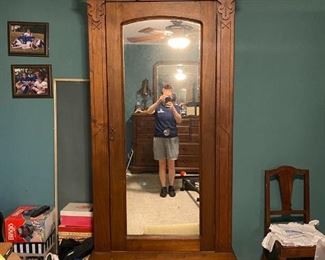 Antique, hand-made wardrobe / armoire with mirrored door