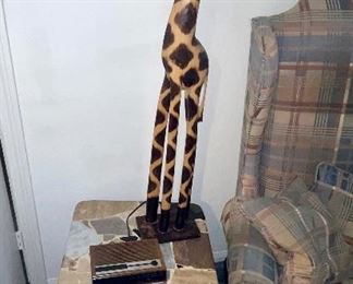 Tall Wooden Giraffe, Clock Radio, Square Table 