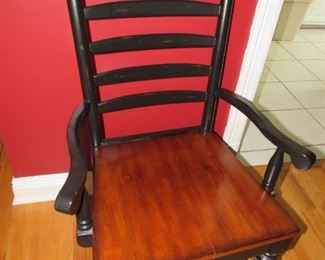 One of 2 captain's chairs with 4 more regular chairs