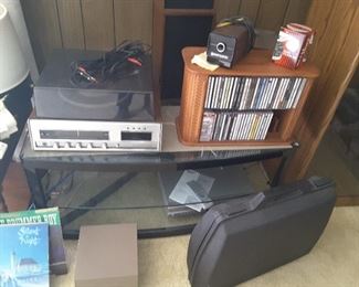 Royal Typewriter Vintage. CD Holder and CDs. Metal Index Holder. Pencil Sharpener. FM/AM JC Penney Stereo 8 Track with Turntable.