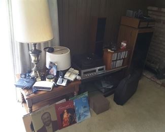 End Table Wood Open Bottom. Bronze Lamp. Vintage Westinghouse Mistaire Hair Dryer. Variety Electronics, Clock Radios. Some Records.