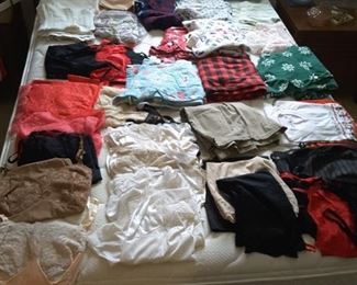Large Collection of Women's Lingerie, Slips, Full and Half Slips, Scarves from Around the World. View of Full Bed and Mattress and Headboard.