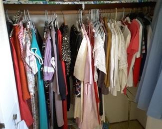 Office, Bedroom: Closet has Women's Vintage Clothing Dresses, Fancy and Regular Wear, Some for Cocktail Parties and some for Work Wear. Short Blouses and Short Very Nice Sweaters. Variety Collectibles above.