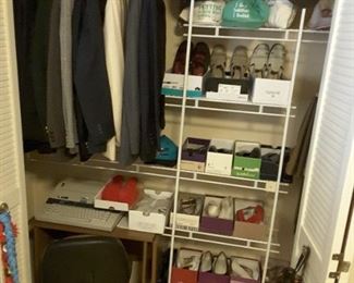 1st Bedroom, Sewing Room Closet filled with Men's Jackets and Women's Dress and Work Shoes in original boxes. Small desk swivel chair. Small Electric Typewriter. Golf Hats. Variety Accessories.