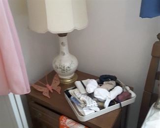 Matching End Table, there are 2 of these. Ceramic Lamp, there are 2 of these. Vintage travel scarf and variety accessories.