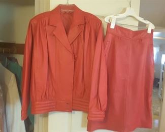 Size 42 Red Leather Jacket, Size 44 Red Leather Skirt. These are European. No Brand Label found. Custom.