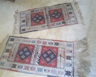 Set of 2 Eastern European Floor Rugs with Fringe. Size is 57X25 with Fringe. (appears as Southwestern but is actually Eastern European).