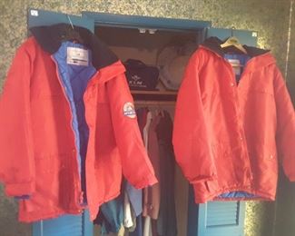 Entry Closet: 2 Red Orient Lines Antarctica Travel Jackets. Travel Jackets in Closet.