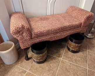 Both animal print wastebaskets are sold