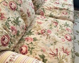 The "Shabby Chic" style sofa has a matching chair.