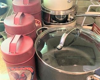 Red canisters; pots & pans